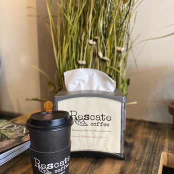Rescate Coffee - a cup of coffee on a table - Coffee & Tea Near Me - Elk Grove, California