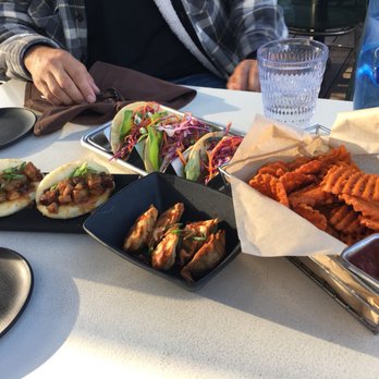 Linger - Pork belly buns, Korean tacos, lemongrass potstickers, and sweet potato fries. - Asian Fusion Near Me - Denver, Colorado Linger - Pork belly buns, Korean tacos, lemongrass potstickers, and sweet potato fries. - Asian Fusion Near Me - Denver, Colorado