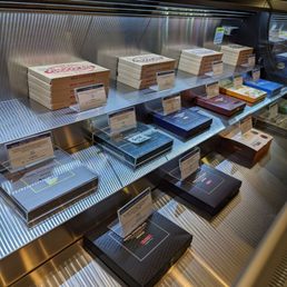  display of boxes of pizza on a conveyor belt