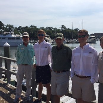 Ship's Store - a group of men standing on a dock - Convenience Stores Near Me - Hilton Head Island, South Carolina Ship's Store - a group of men standing on a dock - Convenience Stores Near Me - Hilton Head Island, South Carolina