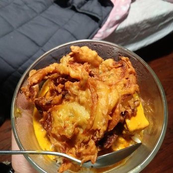 Mount Everest Restaurant - Pakoras on top of paneer tikka masala (they are two separate dishes on menu) - Indian Near Me - Berkeley, California