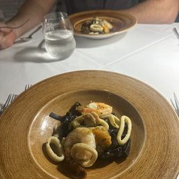Fettuccine al Nero di Seppia alla Pescatore Fettuccine al Nero di Seppia alla Pescatore