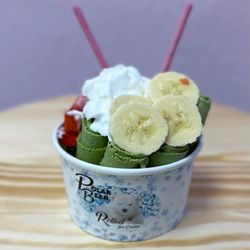 Create Your Own Rolled Ice Cream - Matcha Ice Cream with Bananas, Strawberries, Strawberry Pocky, & Whipped Cream