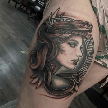Black Relic Tattoo - Tattoo Near Me - Clinton, Iowa Black Relic Tattoo - Tattoo Near Me - Clinton, Iowa