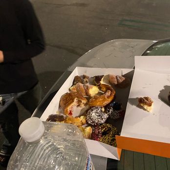 Mag's Donuts & Bakery - As you can see the box was stuffed with donuts, and we tried them all. Kat's graveyard at the top - Donuts Near Me - Irvine, California Mag's Donuts & Bakery - As you can see the box was stuffed with donuts, and we tried them all. Kat's graveyard at the top - Donuts Near Me - Irvine, California