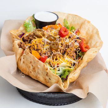 Captn Jack's Bar and Grill - a taco salad in a basket - American Near Me - Tarpon Springs, Florida Captn Jack's Bar and Grill - a taco salad in a basket - American Near Me - Tarpon Springs, Florida