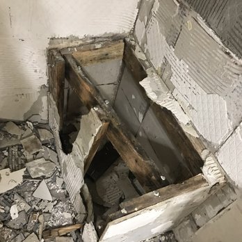 Honey Do - a hole in the floor of a bathroom - Landscaping Near Me