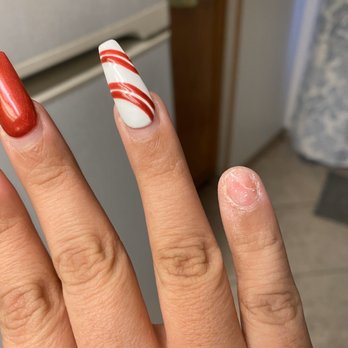Kate Nails - 1st break. what it looked like after her fix came off. The right crack is where she lifted my natural nail. - Nail Technicians Near Me - Ontario, California