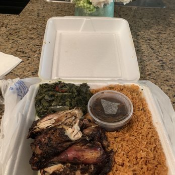 Aldeez Afribbean Restaurant - jerk chicken with jollof rice and sauted spinach - Caribbean Near Me - Dallas, Texas Aldeez Afribbean Restaurant - jerk chicken with jollof rice and sauted spinach - Caribbean Near Me - Dallas, Texas