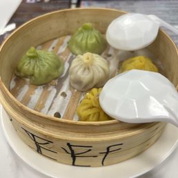 A15. Soup Dumplings (5pc) ! Suuuper good & super soupy! Not dry at all and really flavorful. A15. Soup Dumplings (5pc) ! Suuuper good & super soupy! Not dry at all and really flavorful.