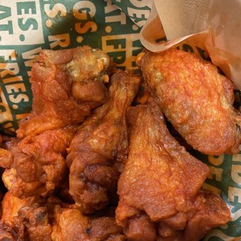 Wingstop - a basket of fried chicken wings - Chicken Wings Near Me - Louisville, Kentucky
