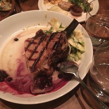 Frances - pork chop half eaten, and grits on the plate in the back - New American Near Me - San Francisco, California Frances - pork chop half eaten, and grits on the plate in the back - New American Near Me - San Francisco, California