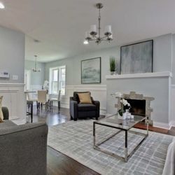 Design on the Edge - Staged Living Room and custom Art