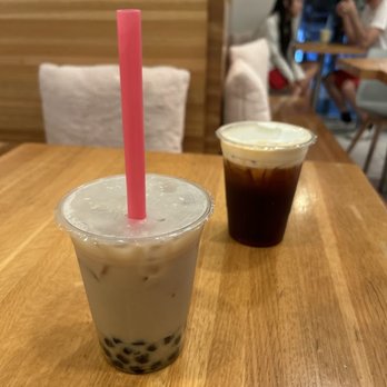 Teas'n You - Brown Sugar Milk Tea with oat milk and boba (front), Thai Milk Tea (back) - Bubble Tea Near Me - Vienna, Virginia Teas'n You - Brown Sugar Milk Tea with oat milk and boba (front), Thai Milk Tea (back) - Bubble Tea Near Me - Vienna, Virginia