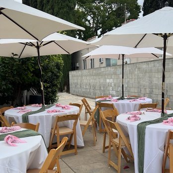 O&H Jumpers - Ordered round tables with umbrellas and light Wooden chairs for that summer vibe look. The linens came ironed and clean. Amazing!!! - Party Equipment Rentals Near Me - Los Angeles, California O&H Jumpers - Ordered round tables with umbrellas and light Wooden chairs for that summer vibe look. The linens came ironed and clean. Amazing!!! - Party Equipment Rentals Near Me - Los Angeles, California