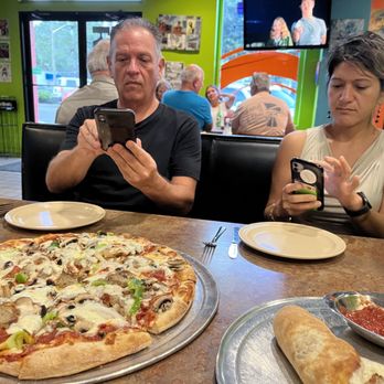 Moon River Pizza - Friends and pizza - Pizza Near Me - Jacksonville, Florida