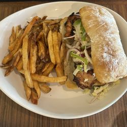 Bistro Phare 756 - Grilled chicken sandwich and fries.