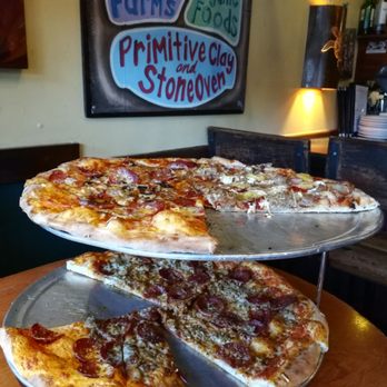 Flatbread Company - Pulled pork half with the other side pepperoni and mushroom. Bottom is sausage and pepperoni. Large size for both. Each is enough for 2. - Pizza Near Me - Paia, Hawaii