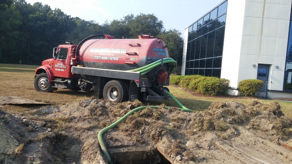 Slide of Wood Septic Tank Company