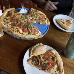 Posta - Posta - Pizza Napolitana and empanada de queso y piña. Delicious