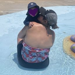 One of the pictures the employee Emilio took for me. My son and I in the kiddy pool area.