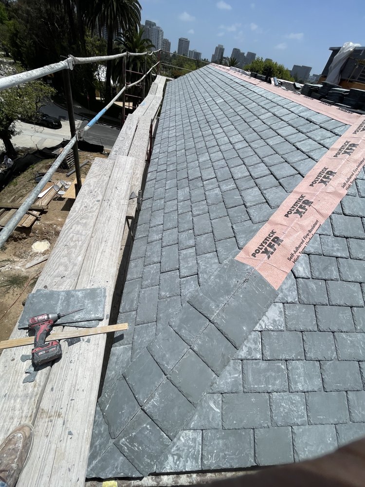 Slide of Dilligent Roofing