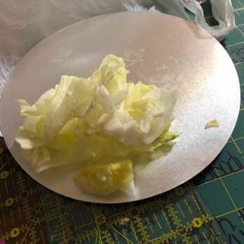 Milano's Pizza - a plate of lettuce on a cutting mat - Pizza Near Me - Hillsboro, Texas Milano's Pizza - a plate of lettuce on a cutting mat - Pizza Near Me - Hillsboro, Texas