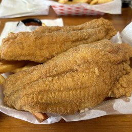 Two catfish fillets and four colossal shrimp! This came hot out of the grease and it was delicious! Two catfish fillets and four colossal shrimp! This came hot out of the grease and it was delicious!