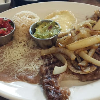 Cafe De Olla - Carne Asada in the dinner menu lots of caramelized onions with sope and tortilla guacamole and pico de gallo - American Near Me - Burbank, California Cafe De Olla - Carne Asada in the dinner menu lots of caramelized onions with sope and tortilla guacamole and pico de gallo - American Near Me - Burbank, California