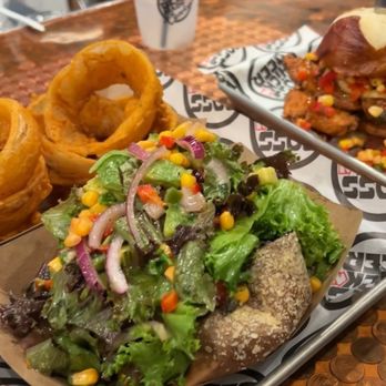Boss ChickNBeer - Stuffed Sweet Potato Loaded with Avocado Salad onion rings - Chicken Wings Near Me - Berea, Ohio