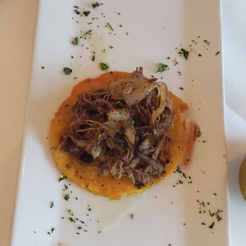 Off The Mile - a plate of food on a table - Cuban Near Me - Coral Gables, Florida Off The Mile - a plate of food on a table - Cuban Near Me - Coral Gables, Florida