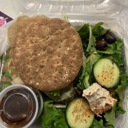 JUICE & MOOR CAFE' & NATURAL MARKET - Lentil burger w/green salad topped with whipped vegan cheese