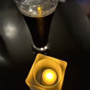 Weinkeller - a lit candle on a table - Wine Bars Near Me - Niagara Falls, Ontario