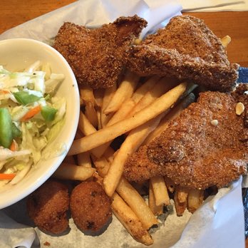 Rockfish Seafood & Grill - Lunch special great price $10.00. Catfish, hush puppies great fries, and apple cider slaw. - Seafood Near Me - Mckinney, Texas
