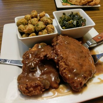 Simply Southern Bistro - Smothered pork chops with collard greens and fried okra - Southern Near Me - Sumter, South Carolina Simply Southern Bistro - Smothered pork chops with collard greens and fried okra - Southern Near Me - Sumter, South Carolina