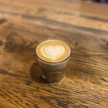 Curio Brewing Company - a cappuccino on a wooden table - Breweries Near Me - Franklin, Tennessee Curio Brewing Company - a cappuccino on a wooden table - Breweries Near Me - Franklin, Tennessee