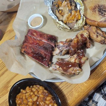 Sonny's BBQ - Ribs and wings, baked beans, sweet potato with cinnamon butter. - Barbeque Near Me - Kingsland, Georgia Sonny's BBQ - Ribs and wings, baked beans, sweet potato with cinnamon butter. - Barbeque Near Me - Kingsland, Georgia