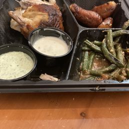 1/2 chicken with green beans, plantains, salsa verde and garlic sauce. 1/2 chicken with green beans, plantains, salsa verde and garlic sauce.