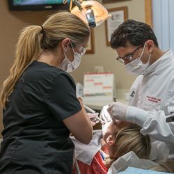 Vincent Mariano, DMD - Dr. Mariano treating a patient