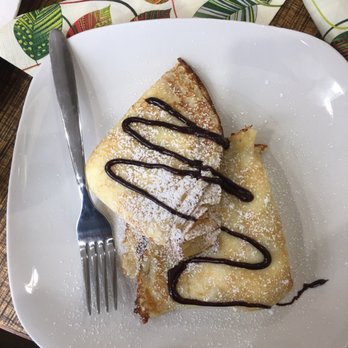 Sweet Generation - a piece of pastry on a plate with a fork - Bakeries Near Me - Wood Dale, Illinois