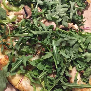 Blaze Pizza - Green peppers, spinach, mushrooms, chicken, pesto, mozzarella, onions, minced garlic, with olive oil and arugula on top. Delicious!! - Salad Near Me - Orange, California