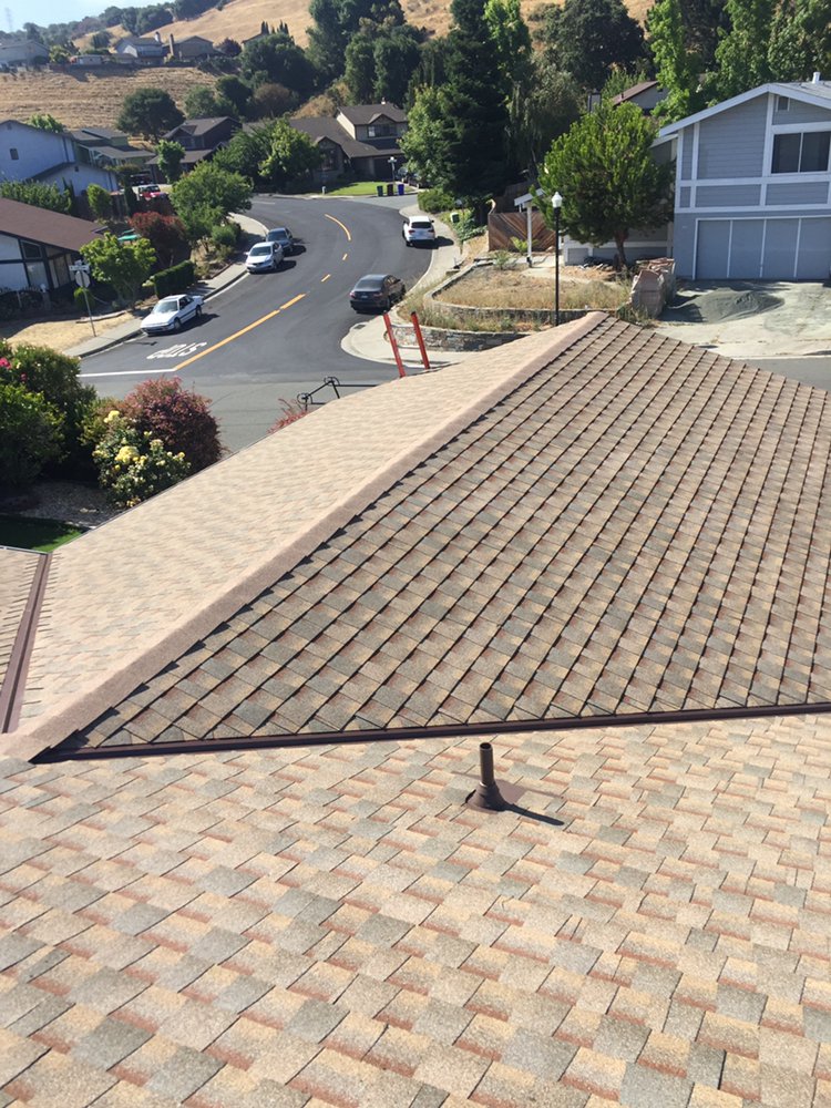 Slide of RECO Roofing