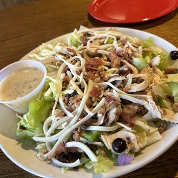 Brick Oven Pizza Company - Mortar salad with Chicken , black olives, red onions, bacon bits, Greek sauce, bell peppers, mozzarella cheese - Pizza Near Me - Abilene, Texas
