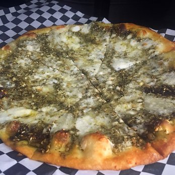 Man'oushe Express - Zaatar and Cheese Flatbread: wild thyme, oregano, sesame, sumac and olive oil - Pizza Near Me - Seattle, Washington Man'oushe Express - Zaatar and Cheese Flatbread: wild thyme, oregano, sesame, sumac and olive oil - Pizza Near Me - Seattle, Washington