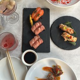 Velvet Roll, Shinobi Roll, Blue Fin Otoro, King Crab Sando, Sake Nigiri, Summer Affair, and Eight's Lychee Martini