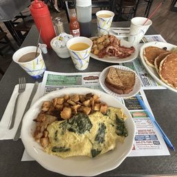 3 egg omelet with feta and spinach- home fries, gluten free toast, pancakes, bacon and more home fries! 3 egg omelet with feta and spinach- home fries, gluten free toast, pancakes, bacon and more home fries!