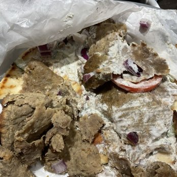 Ambrosia Kafeneio - This is the gyro. On the left, we tried to "wash the meat" under water to make it palatable. - Greek Near Me - Boone, North Carolina Ambrosia Kafeneio - This is the gyro. On the left, we tried to "wash the meat" under water to make it palatable. - Greek Near Me - Boone, North Carolina