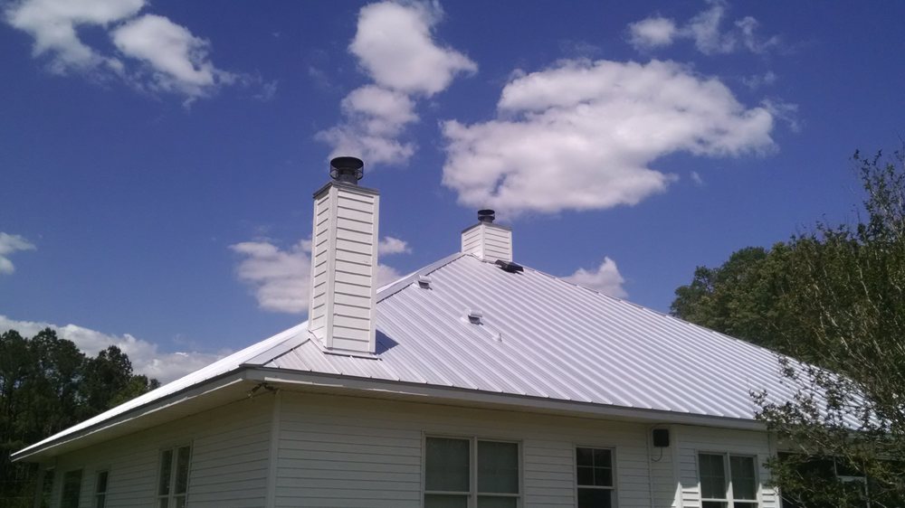 Slide of Tadlock Roofing