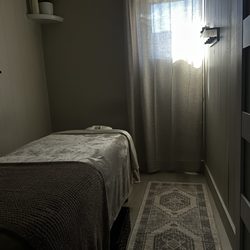 Treatment table, and basket for clients clothes.