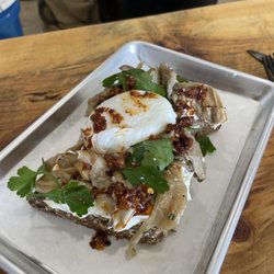 Collab Cafe - Mushroom toast with herb cheese, soft poached egg and chili crunch